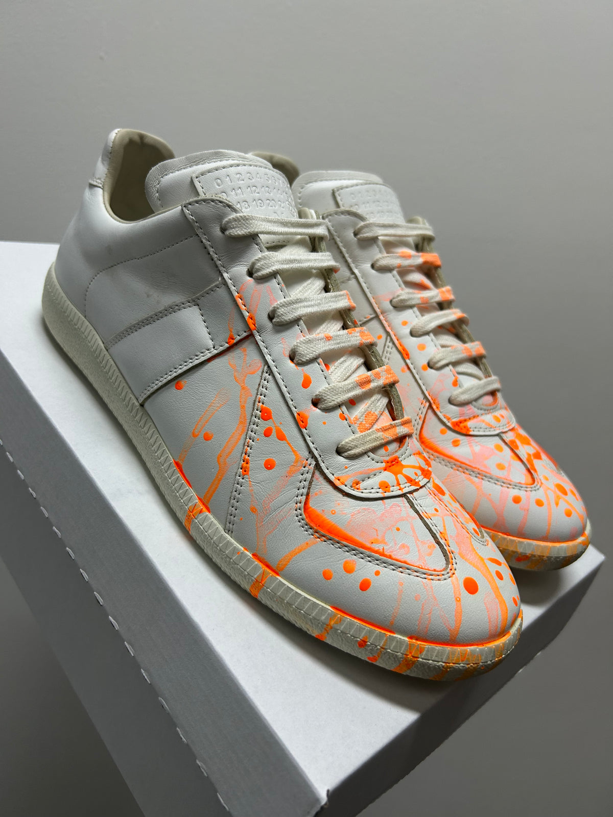 Maison Margiela White and Orange Paint Splatter Replica Sneakers
