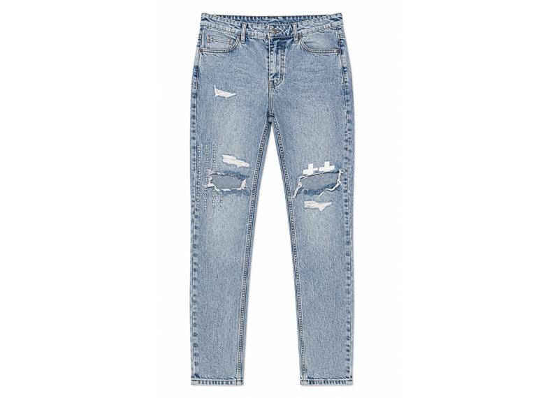 KSUBI KNEE RIPPED CROSS PATCHED LIGHT WASH JEANS